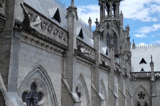 Red and blue footed boobies featured among the basílica's gargoyles